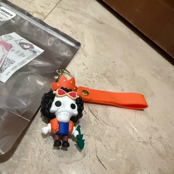 Skull Keychain with Orange and Blue Accents - Picture 2 of 5